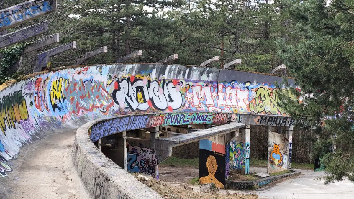 Abandoned bobsleigh track covered in graffiti