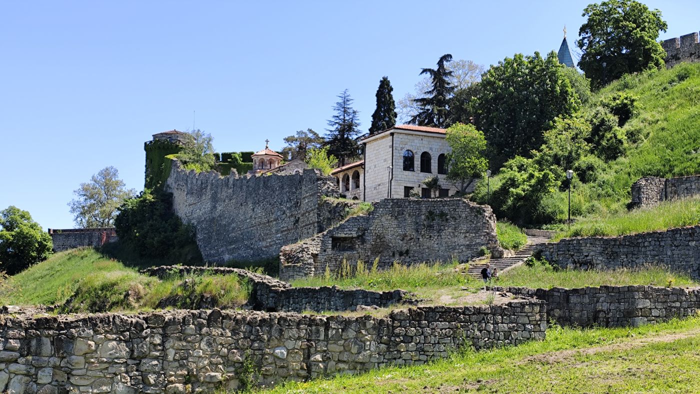 Old fortress walls on a green hill