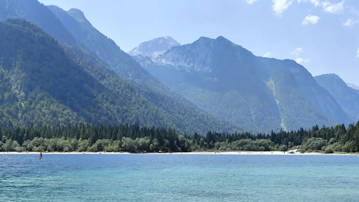 A turquoise mountain lake below limestone peaks